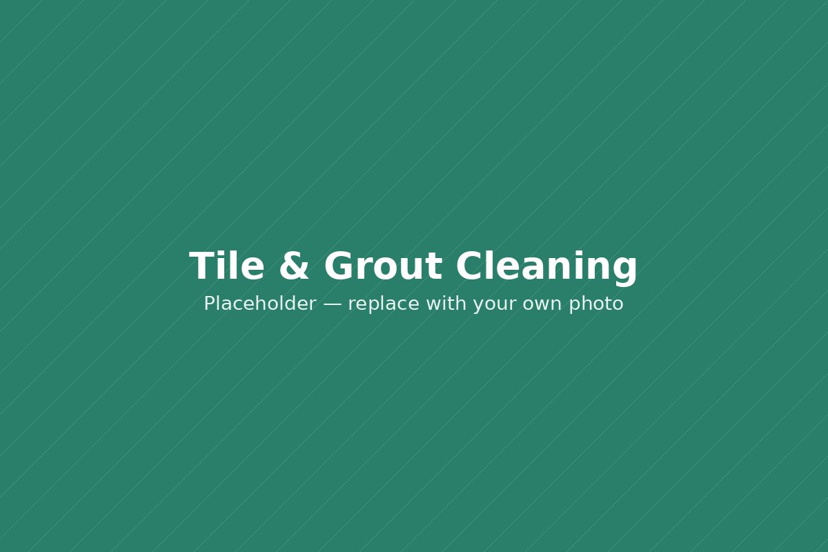 Tile and grout line being cleaned